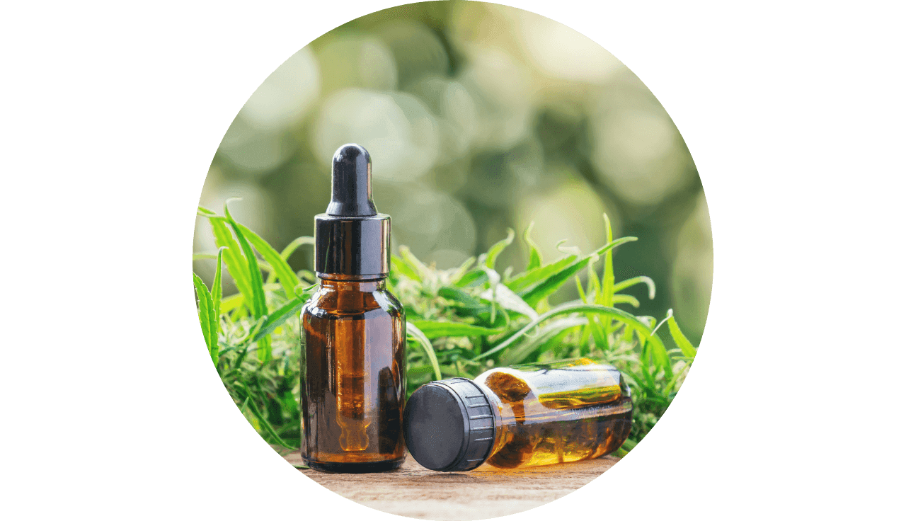 Extrakte mit Cannabisblatt im Hintergrund
